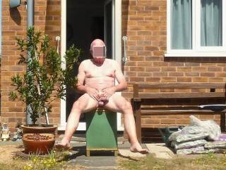 It was so warm outside and my neighbour had gone out so I just had to take my cock outdoors