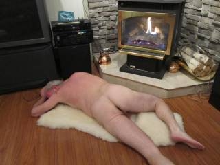 Mmm so warm and comfy by the fire on the sheep skin I'll bet there is room for two