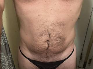 Wearing Black Laced G-String Panties. The hardening bulge and my hard nipples   I’m so horny and need a release!