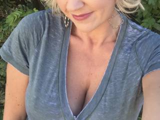 smirking to my friends who I know would luv to slip n slide down my cleavage to possible entice me for a tittie fuck or some tittie suckin...get this shirt off me and tease ...PLEASE! 
xx