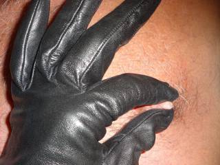 We like to play games - so she did a little nipple play while wearing her leather gloves