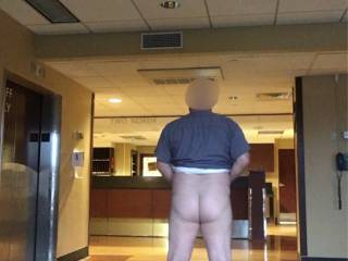 The nurses were off giving mess to the patients. Dropped my pants and took a quick picture before they came back. Almost got caught!  Just as I finished pulling up my pants, the elevator doors opened!