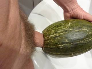 Masturbating with a juicy melon fruit imagening some hot ladies sucking on and fucking with my dick