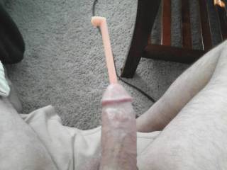 His dick getting hard, a silicone sound halfway inserted, this photo goes with the video.