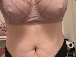Showing off her boobs in her bra and panties. Look at how hard those nipples are