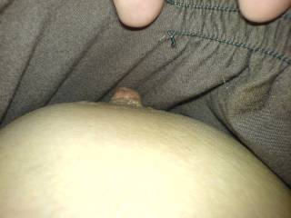 here is a glimpse of my wife\'s beautiful nipple! What do you think?