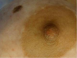 wife sent me a pic of her nipple while I was at work, hopefully she sends more
