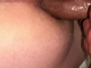 One of our “guests” wanted to take home a close-up of my slut taking cock in both her holes. We’ve both just cum down her throat so I wasn’t rock hard—sorry! Still felt great! Want some?