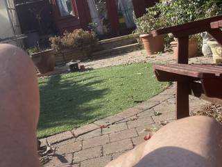 Im laying naked im my garden 
Anyone want to be naked with me and then turn my soft cock to stiff and how
