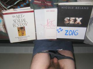 A view from above of my dick & 3 sexual books on my bed. Pic taken with C7070 camera.