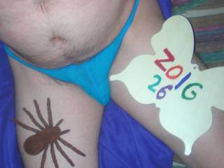 I am sitting on my bed, wearing my undie.  A Nikon S10 camera was used.