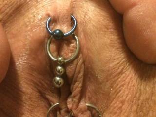 Just a super close shot of her new jewelry. We played Hell trying to find The dangling ball that hangs over the clit. I absolutely love her pussy. What do you think?