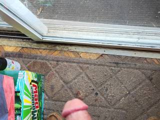 Standing at the door nude