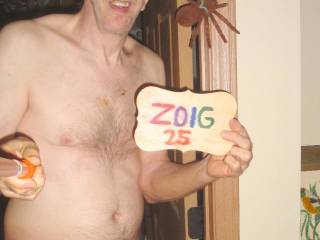 A selfie partial body frontal as I stand in my bed room doorway.
