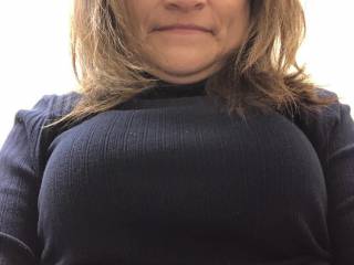 teasing at work showing a peak of my boobs
