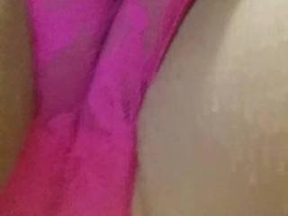 She plays with her pussy thru her panties turn up volume listen to that creamy pussy and if you watch closely you’ll see the cream she produces inside them.