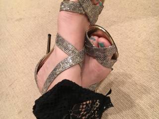 Taking a few pictures of my Jimmy Choo's.  The underwear add a nice touch, don't you think?