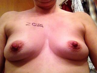 mmmm sweetheat what lovely tits and nipples! would be a sheer delight to lick and suck those! how about one for hubby and one for me?