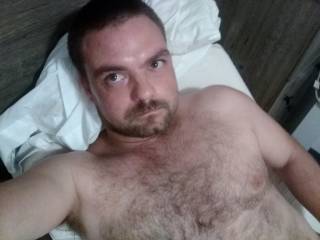 Laying in bed with hard on jacking off waiting for wife to get out of shower to fuck