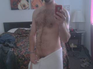 just out of the shower, teasing pose with my towel.. :) Who would like to come remove the towel?
