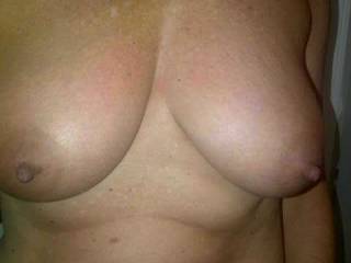 my wife\'s beautiful tanned breasts