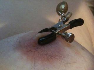 Me trying out my new nipple clamps , i share who wants to be next ??