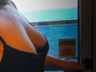 Mrs. McLovin heading out to our balcony on a cruise ship  in the Bahamas. Who wants to join us for the next one?