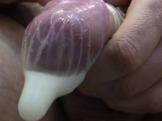 Tried edging in a condom to collect the cum and to see the cum ooze
