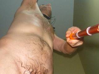A selfie frontal of my body from below as I am standing near the tub/shower & reaching for a portable LED light...September 2025. 1 of 2 TS3 camera`s was used.