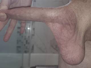 When I stretch myself out like this while flaccid, it spans 10 inches.