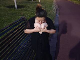 Licking one\'s own breasts outdoors