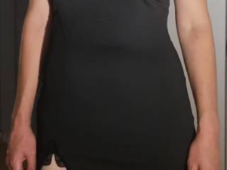 Sexy little black number, you can see her nipples poking through, what would you do with her?