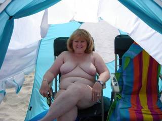 Showing off at the nude beach. How you like my shade tent?