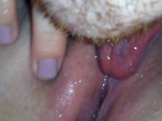 My favorite thing to do. Eating pussy and playing with the clit...sloshing wet.
