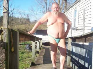 Outside in my light blue thong.