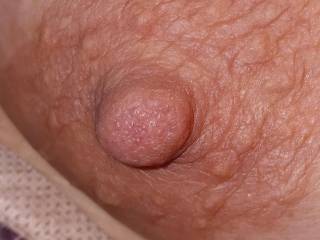 Another closeup of my beautiful wife's incredible nipples. Wait till you see them erect.