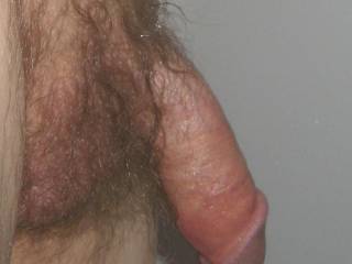 A side close up as I stand after my shower in late April 2025. A Canon 630 camera was used.