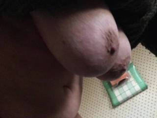 Bending over the bed yesterday, jiggling her hanging big tits. Lovely :)