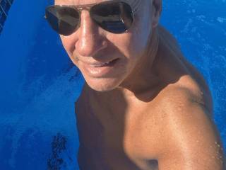 Naked in the pool.
