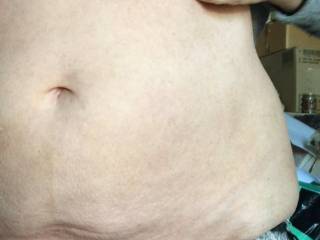 Getting ready for some poses, the photographer helps her