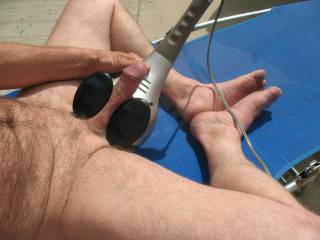 Enjoying my back massager on my cock outside on the patio last summer. Love being naked & free outside in the summer. Are you waiting for summer too?