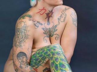 Love the art.. You should be a model for "women with ink and curves"  ;)