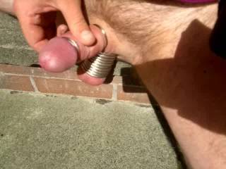 Jerking off in my back yard. 10 rings on my balls. Do you like it?