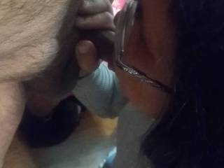 Sondra on her knees taking cock