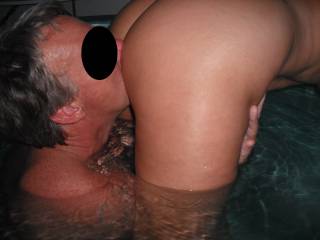 Our swinger friend eats out my pussy in the spa at home, when he came around again for a threesome.