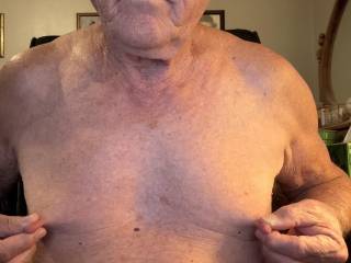 Playing with my long nipples