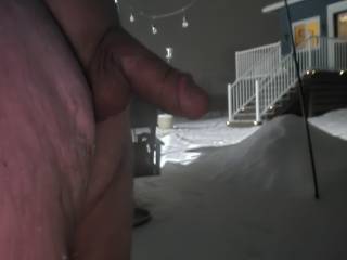 Naked outside on a snowy night.