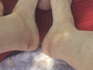 Rubbing my dick with her feet..
