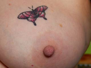 I think her nipple is very pretty...
Have YOU noticed her tattoo thru her tops in Sussex?