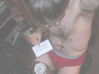 Just showing you the wet spot on my red underwear,while sitting at my desk with a old fashion bell clock.